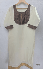 Ivory cotton women’s ethnic top with brown printed yoke, small button detail, printed sleeve cuffs, and straight fit.