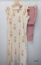 Ivory cotton 2-piece co-ord set with pink and brown botanical motifs, ruffled sleeveless shoulders and vertically striped matching bottom.