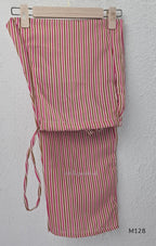 Ivory cotton 2-piece co-ord set with pink and brown botanical motifs, ruffled sleeveless shoulders and vertically striped matching bottom.