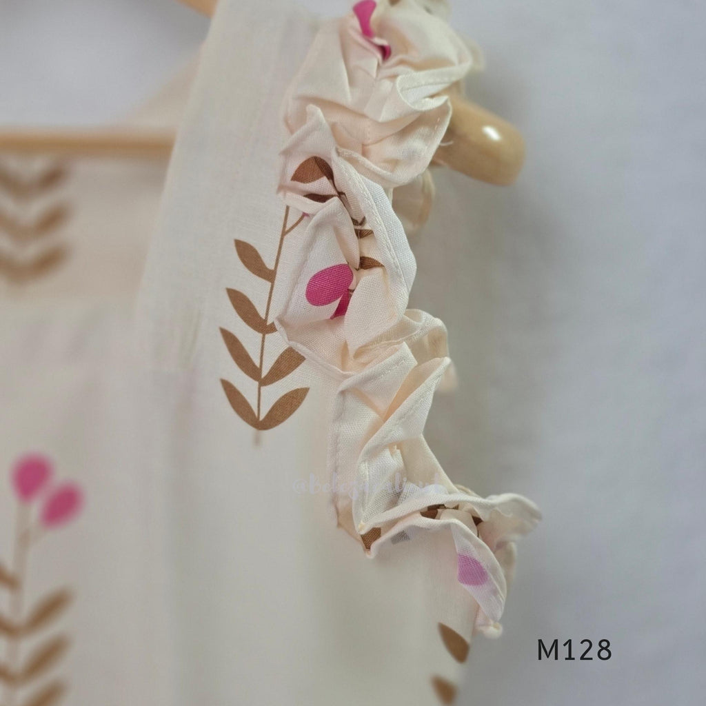 Ivory cotton 2-piece co-ord set with pink and brown botanical motifs, ruffled sleeveless shoulders and vertically striped matching bottom.