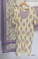 Ivory cotton 3-piece churidar set with dusty lavender floral motifs, contrast printed yoke, matching striped bottom and floral bordered dupatta.