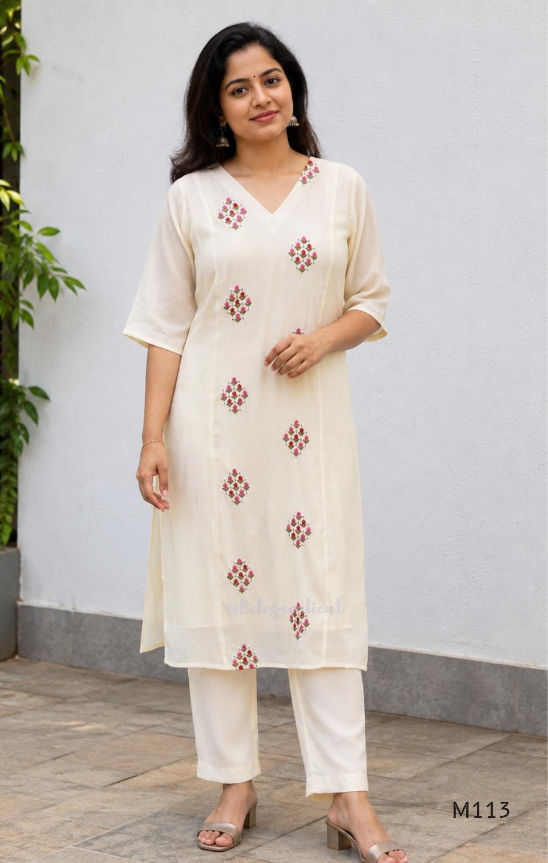 Ivory mul chanderi 2-piece co-ord set with pink-red floral embroidery, V-neck top and matching straight pant.