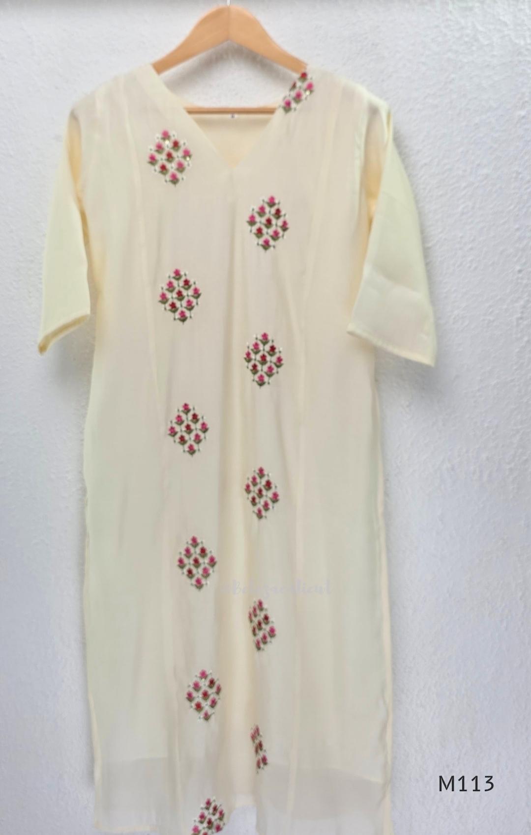 Ivory mul chanderi 2-piece co-ord set with pink-red floral embroidery, V-neck top and matching straight pant.