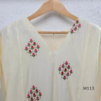 Ivory mul chanderi 2-piece co-ord set with pink-red floral embroidery, V-neck top and matching straight pant.