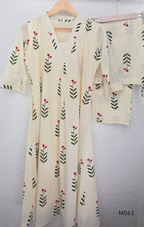 vory cotton lined 2-piece A-line set with green stem and pink blossom print, V-neck, relaxed fit, one pocket.