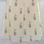 vory cotton lined 2-piece A-line set with green stem and pink blossom print, V-neck, relaxed fit, one pocket.