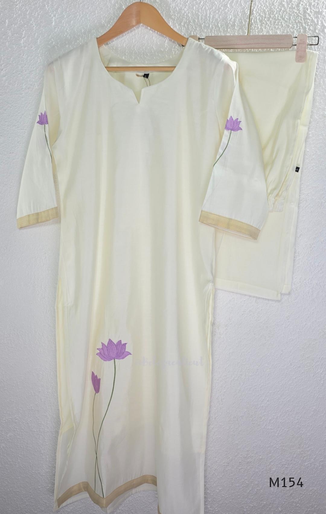 Ivory Roman Silk top and bottom coord set with lilac lotus embroidery and gold edging.