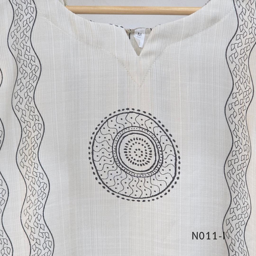 Ivory Vertigan silk co-ord set with dark circular motifs, wavy side-border print and matching straight pants.
