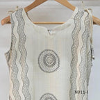 Ivory Vertigan silk co-ord set with dark circular motifs, wavy side-border print and matching straight pants.
