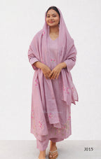 Woman wearing a pink traditional outfit with a matching dupatta on a white background