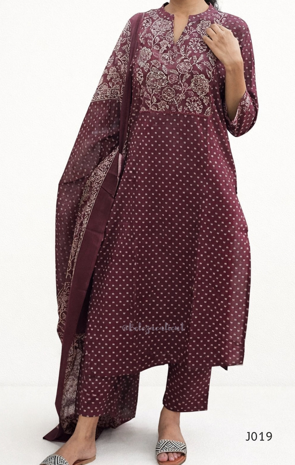 Maroon patterned kurta with matching dupatta on a white background