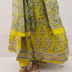 Yellow and gray patterned traditional outfit on a plain background