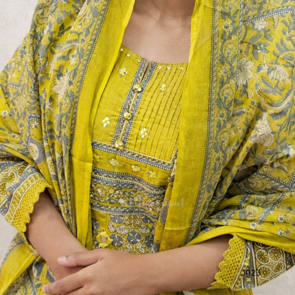 Yellow and gray patterned garment with floral designs