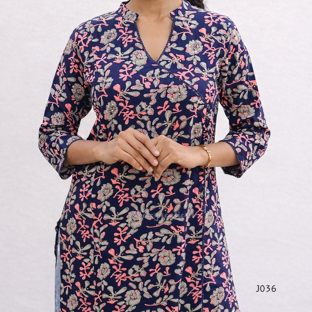 Navy blue floral patterned kurta worn by a person on a white background