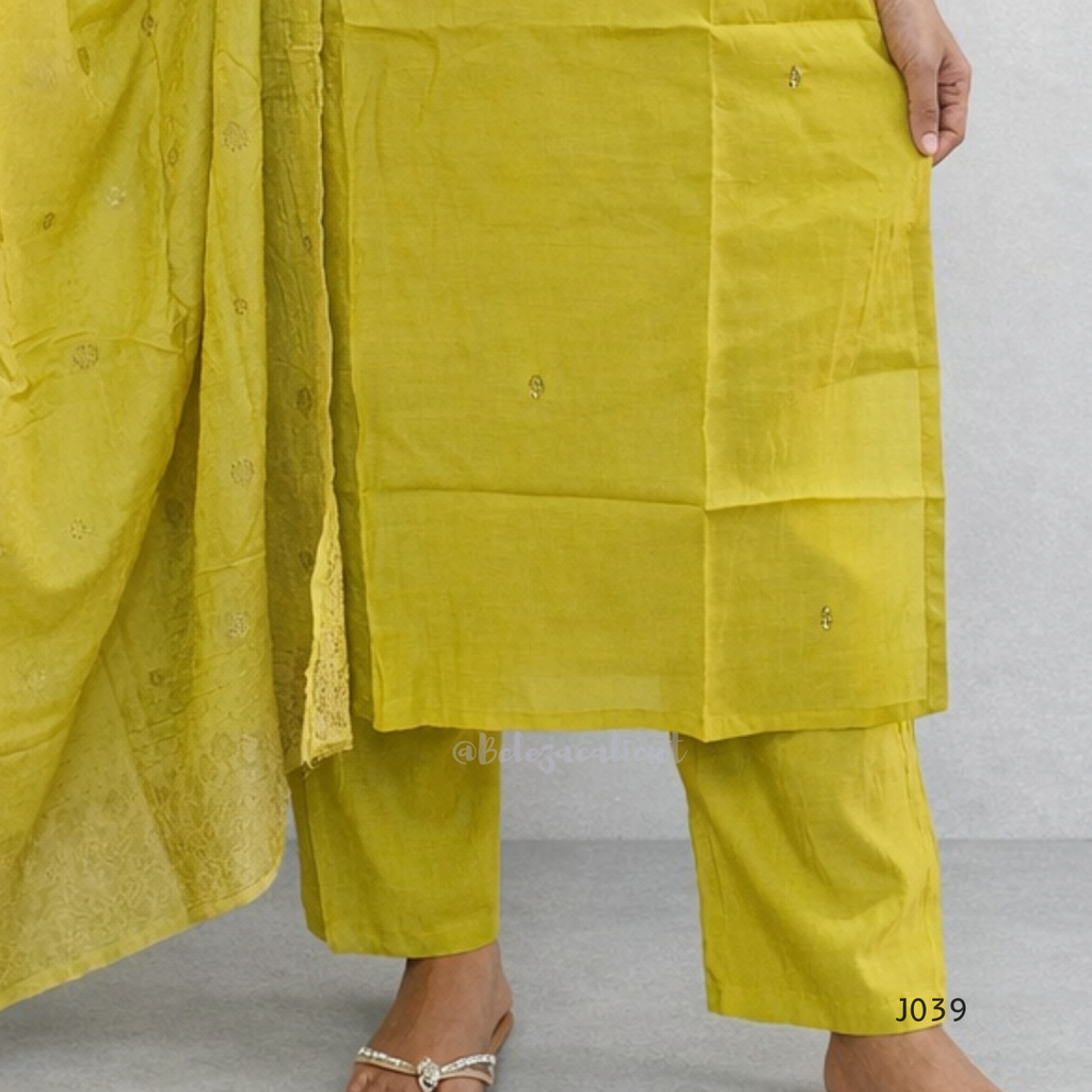 Yellow traditional outfit with a plain background