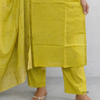Yellow traditional outfit with a plain background
