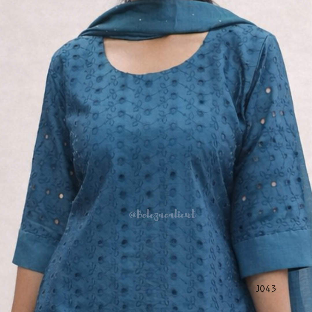 Blue patterned top with a plain background