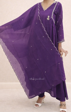 Purple traditional outfit with a matching dupatta