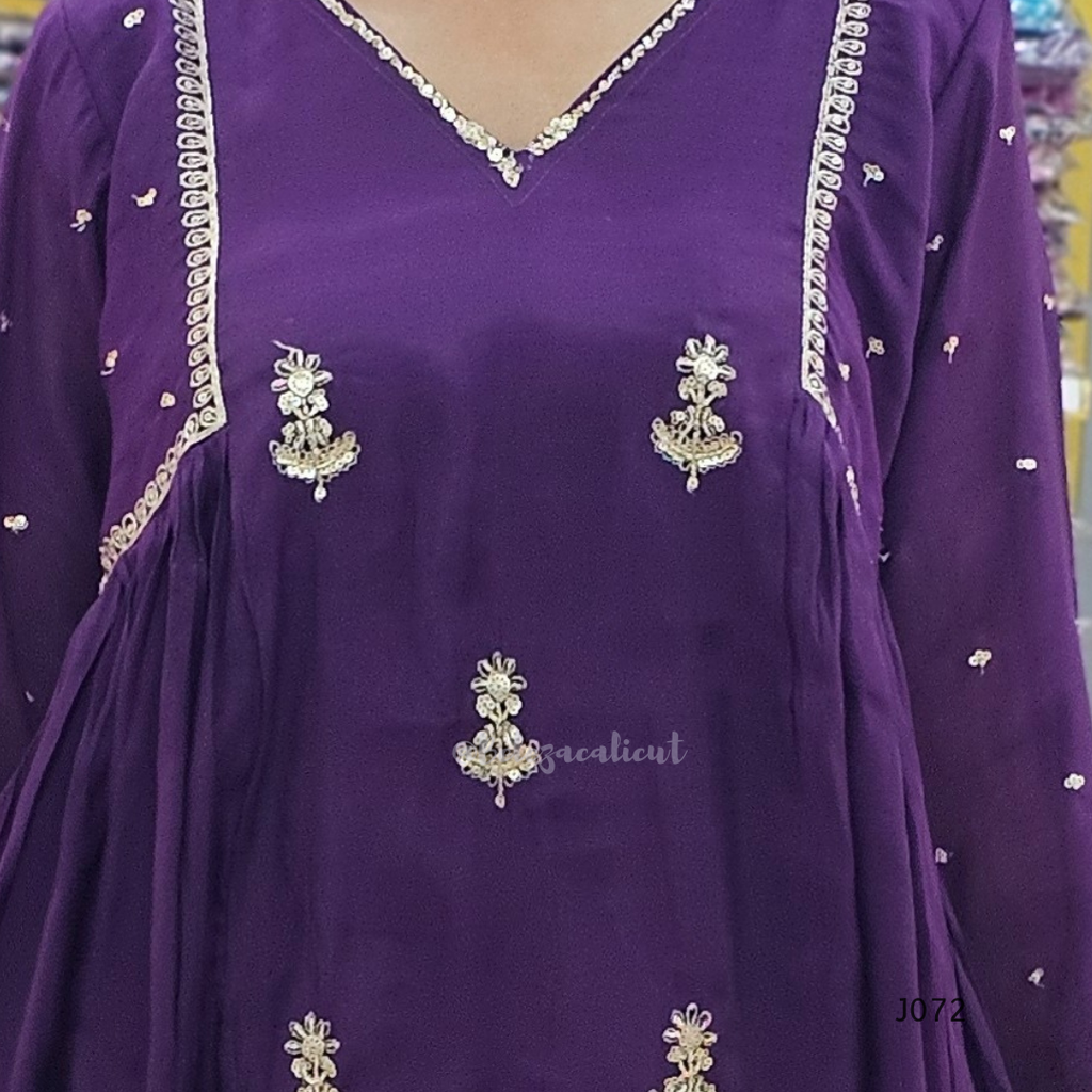 Purple garment with silver embroidery details