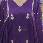 Purple garment with silver embroidery details