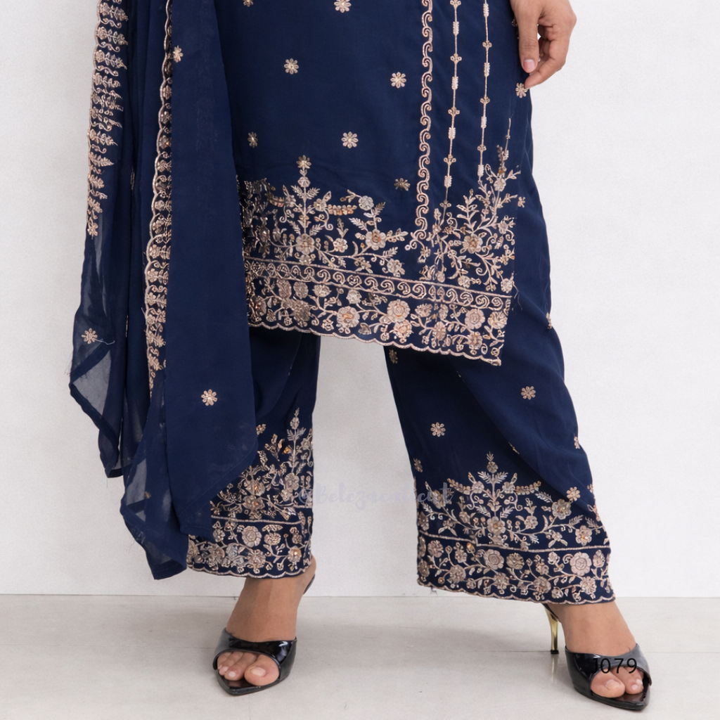 Navy blue traditional outfit with gold embroidery on a white background