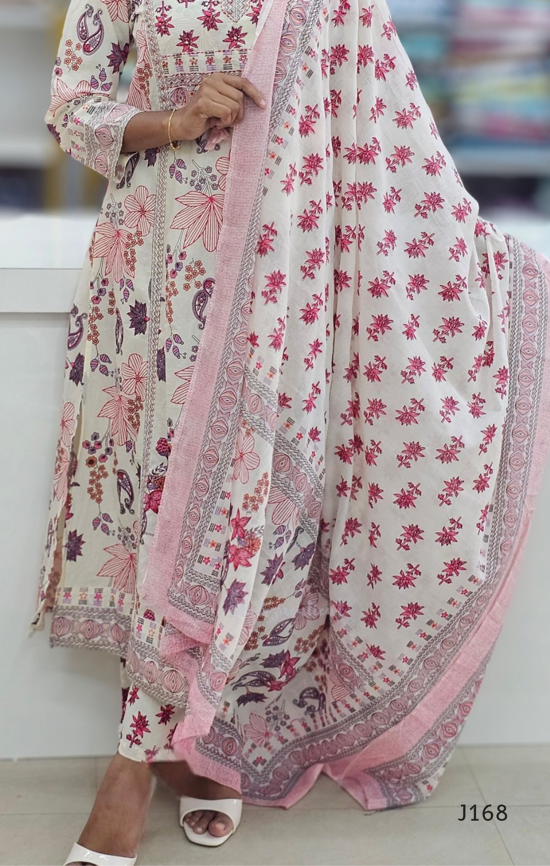 Floral dress with matching dupatta on a white background