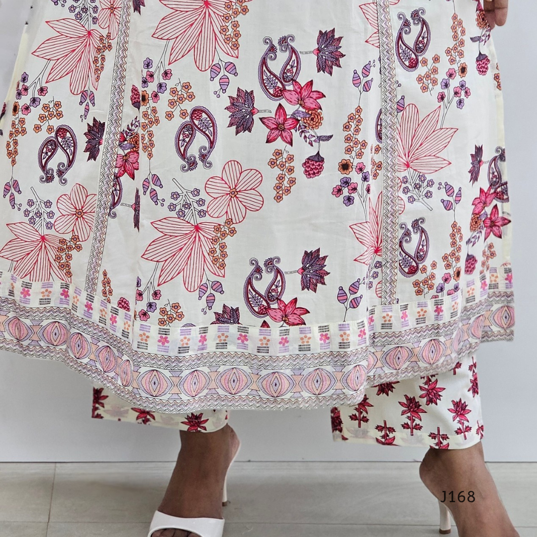 Floral and paisley patterned fabric with a person wearing it.