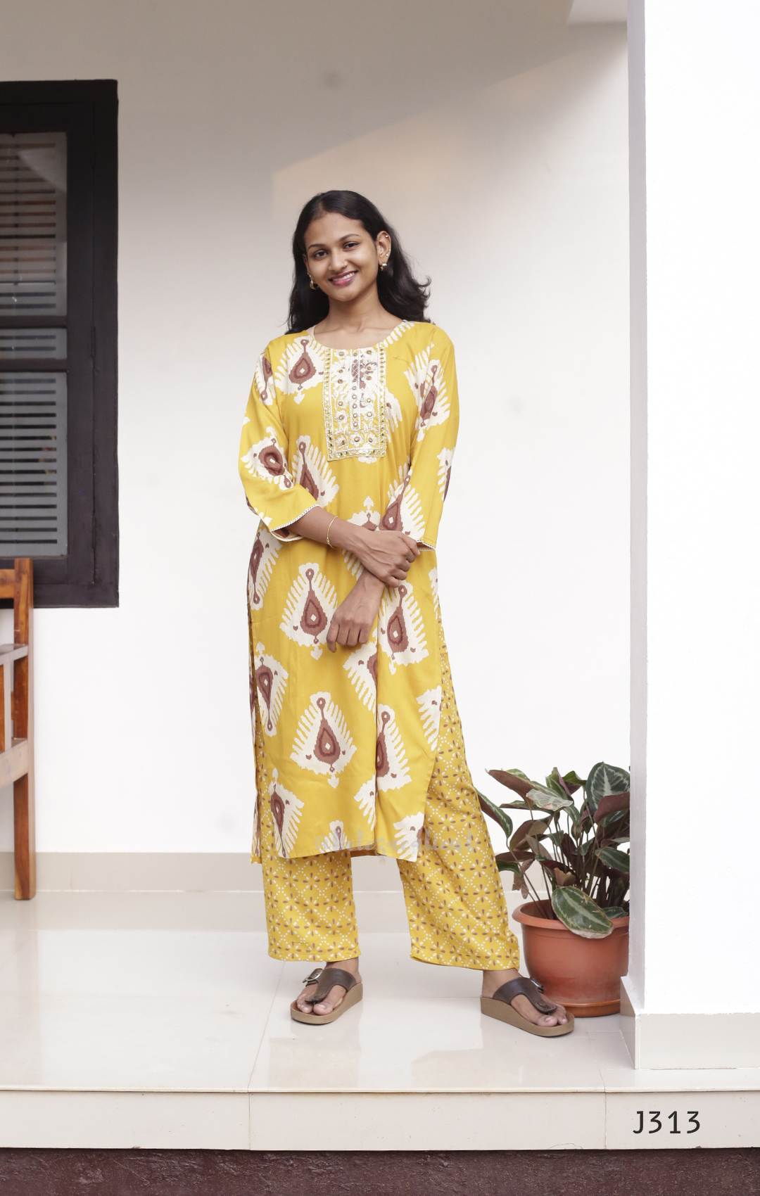 Mustard yellow soft cotton kurti set with cream brown ikat-style print and matching printed bottom, available at Beleza Calicut Kerala.