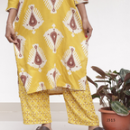 Mustard yellow soft cotton kurti set with cream brown ikat-style print and matching printed bottom, available at Beleza Calicut Kerala.