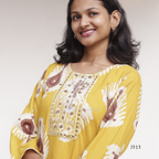 Mustard yellow soft cotton kurti set with cream brown ikat-style print and matching printed bottom, available at Beleza Calicut Kerala.