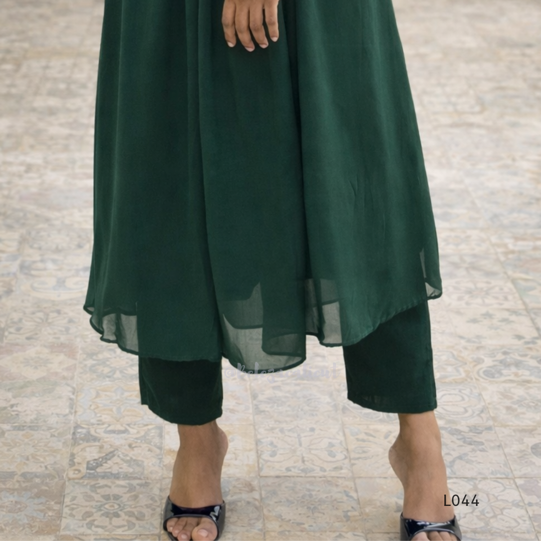 Green dress with a plain background