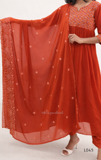 Red traditional outfit with a matching dupatta on a white background