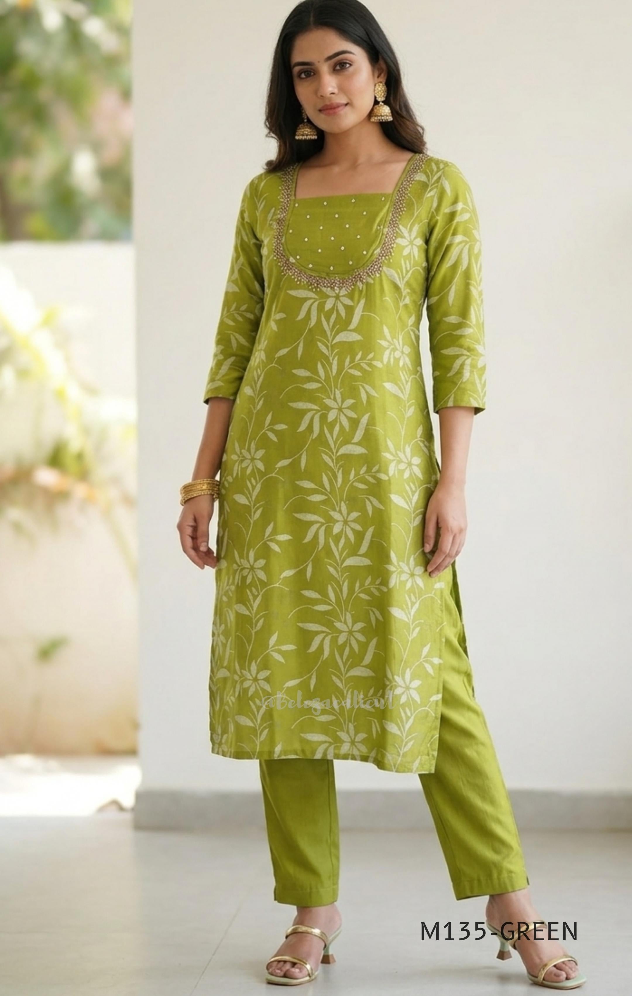 Leaf green silk blend 2-piece set with ivory botanical print, embellished deep neckline, three-quarter sleeves and matching plain bottom.