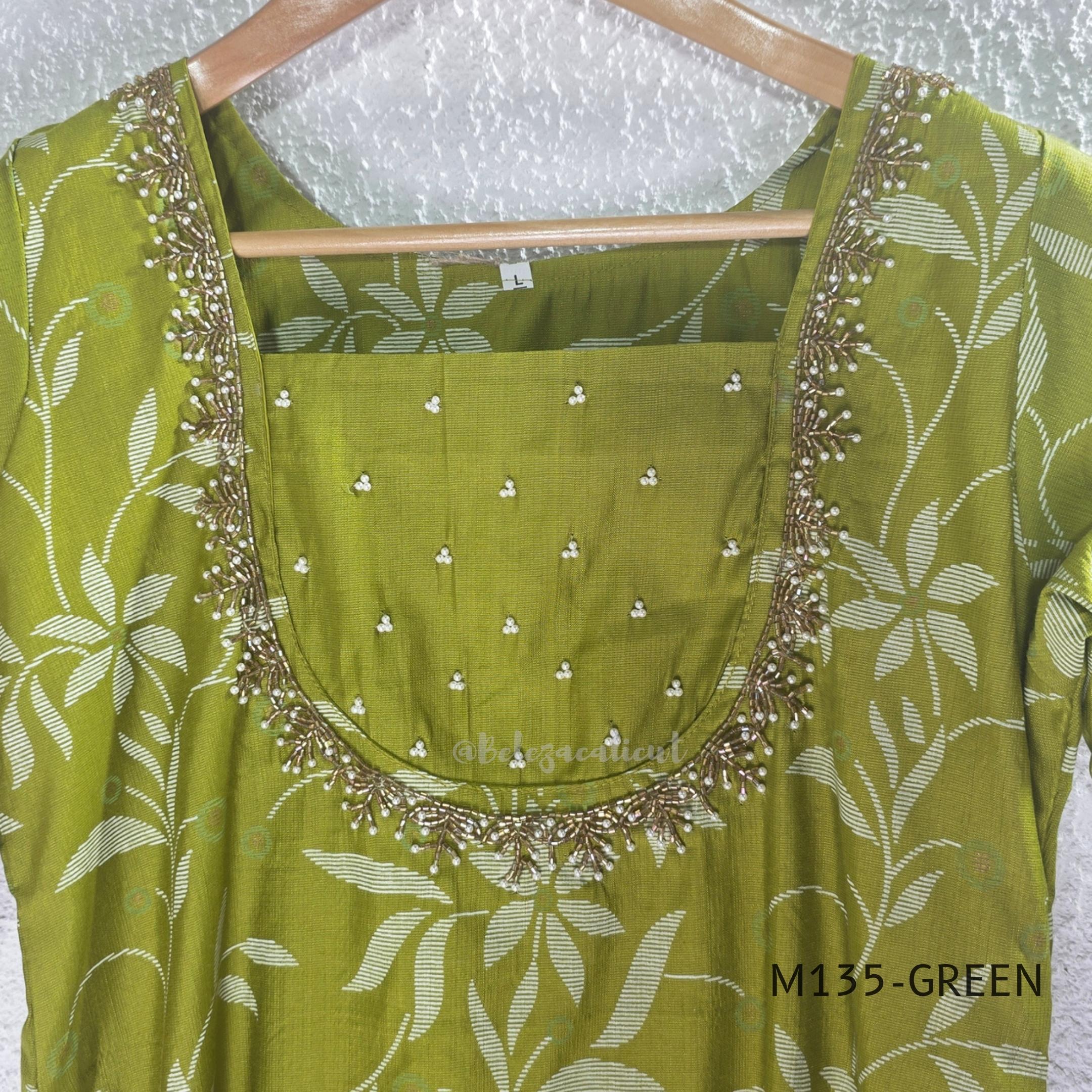 Leaf green silk blend 2-piece set with ivory botanical print, embellished deep neckline, three-quarter sleeves and matching plain bottom.
