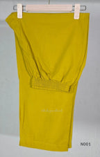 Lime yellow cotton top and bottom set with multicolour paisley and floral print and decorative V-neck trim.