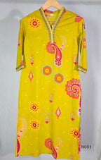 Lime yellow cotton top and bottom set with multicolour paisley and floral print and decorative V-neck trim.