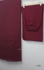 Maroon mul chanderi churidar set with silver sequin neckline, sleeve detailing, matching bottom and dupatta at Beleza Calicut.