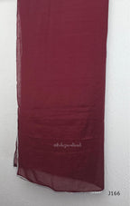 Maroon mul chanderi churidar set with silver sequin neckline, sleeve detailing, matching bottom and dupatta at Beleza Calicut.
