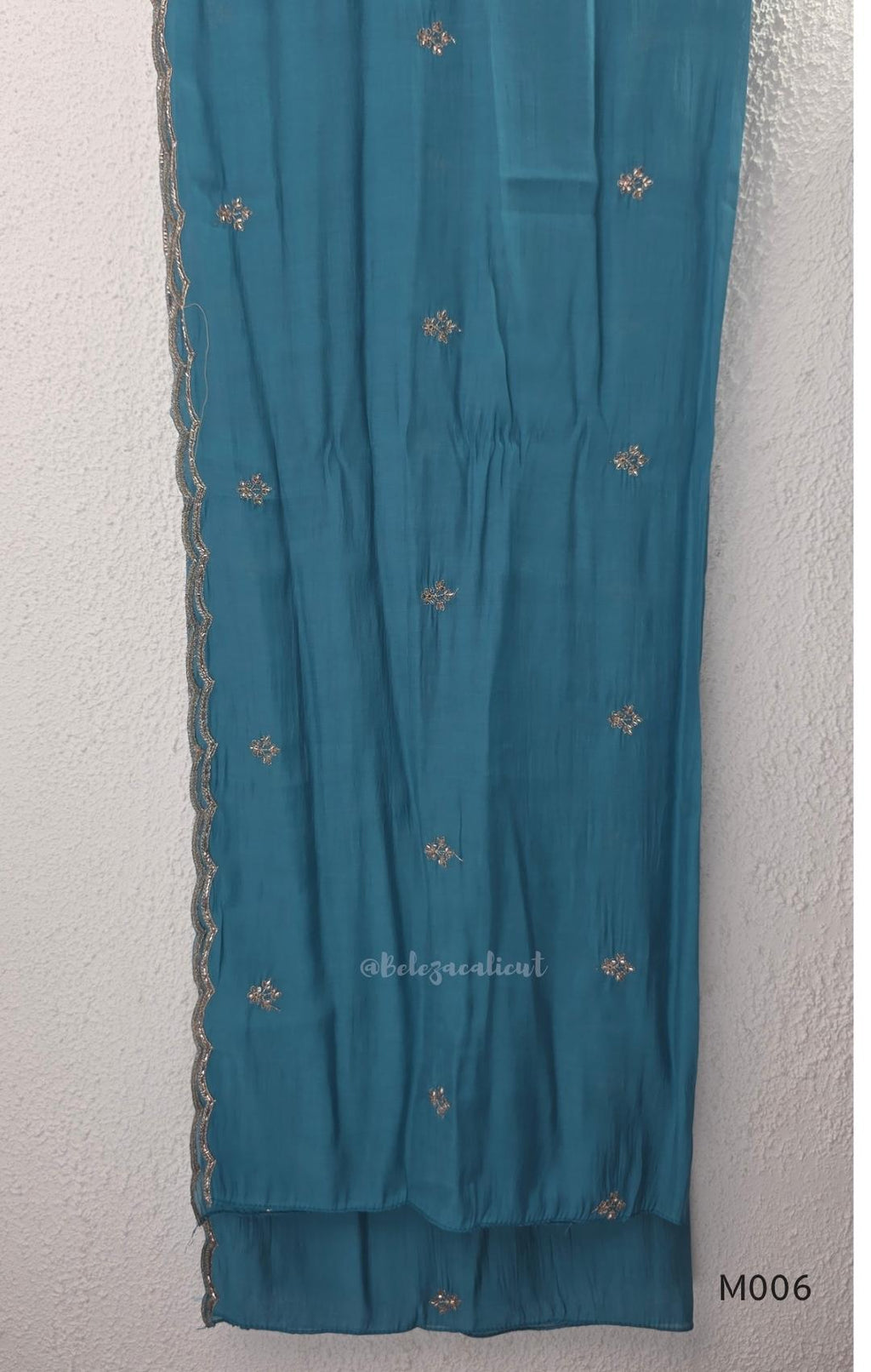 Mul chanderi embroidered A-line 3-piece churidar set with matching dupatta and bottom in festive colour options.