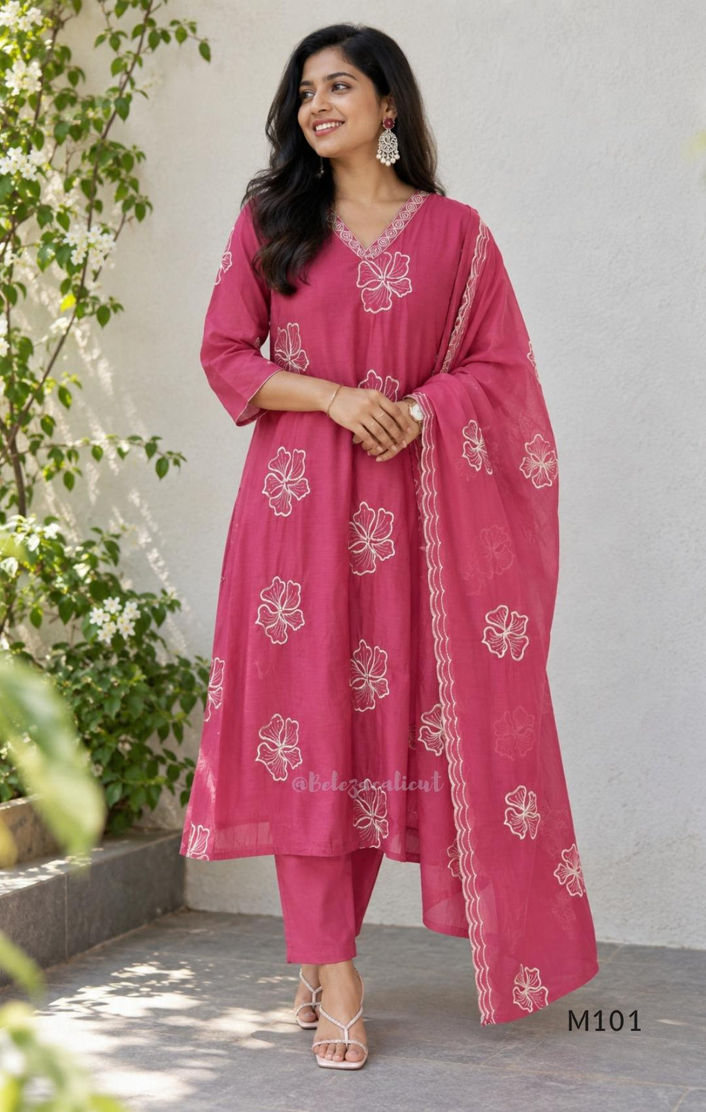 Pink Mul Chanderi A-line churidar set with floral embroidery, matching straight-leg bottom and floral dupatta at Beleza, Calicut.
