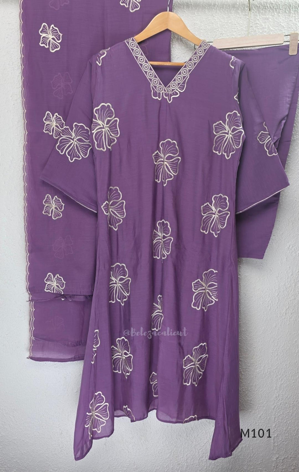 Lavender purple Mul Chanderi A-line churidar set with floral embroidery, matching straight-leg bottom and floral dupatta at Beleza, Calicut.