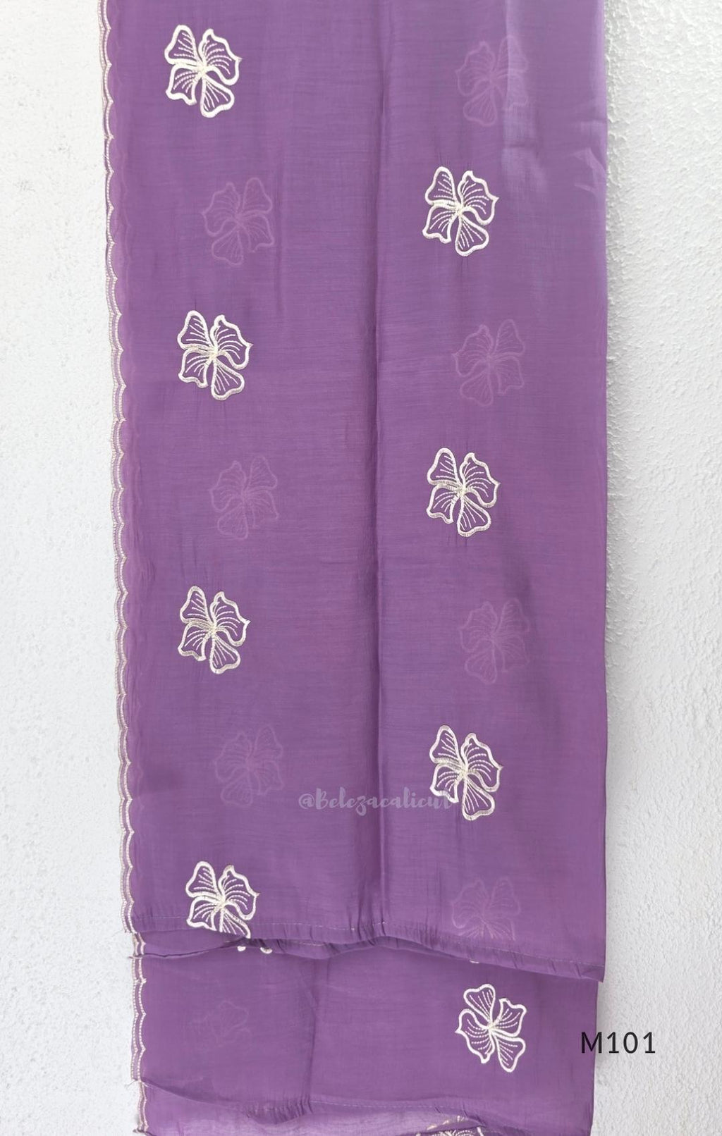Lavender purple Mul Chanderi A-line churidar set with floral embroidery, matching straight-leg bottom and floral dupatta at Beleza, Calicut.