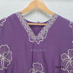 Lavender purple Mul Chanderi A-line churidar set with floral embroidery, matching straight-leg bottom and floral dupatta at Beleza, Calicut.