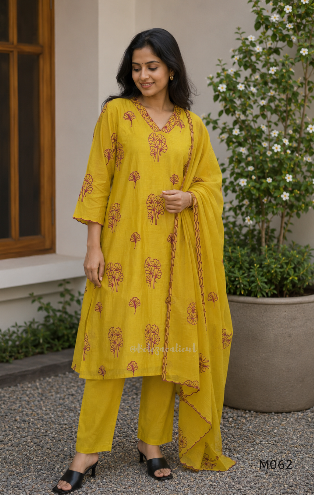 Mul chanderi A-line 3-piece churidar set in coral, lavender, mustard and rust orange with thread work.