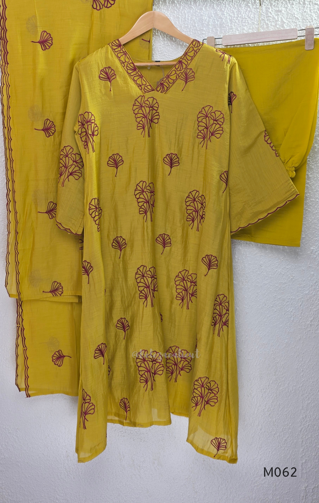 Mul chanderi A-line 3-piece churidar set in coral, lavender, mustard and rust orange with thread work.