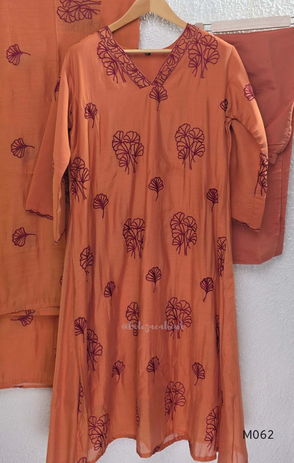 Mul chanderi A-line 3-piece churidar set in coral, lavender, mustard and rust orange with thread work.
