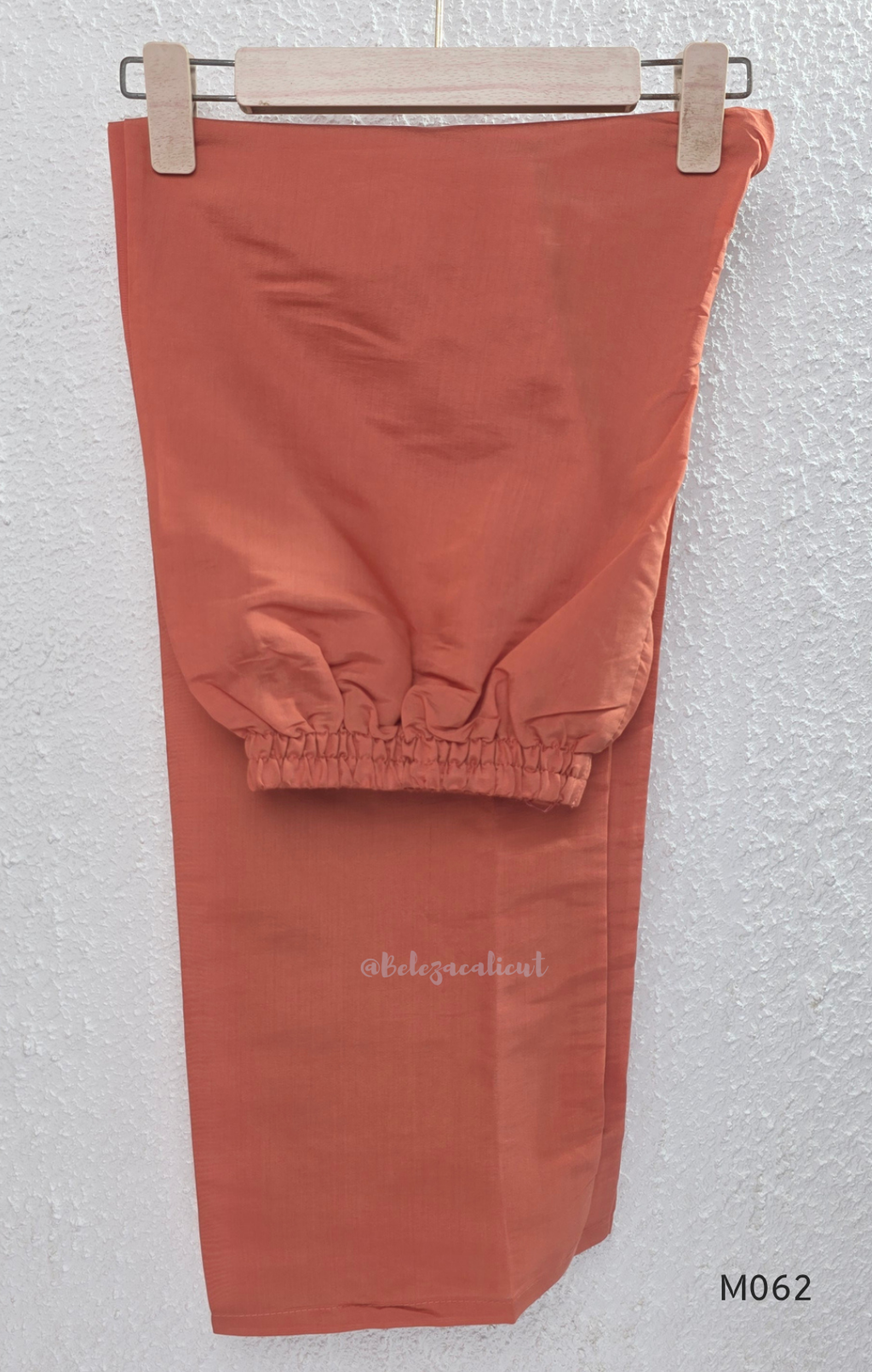 Mul chanderi A-line 3-piece churidar set in coral, lavender, mustard and rust orange with thread work.