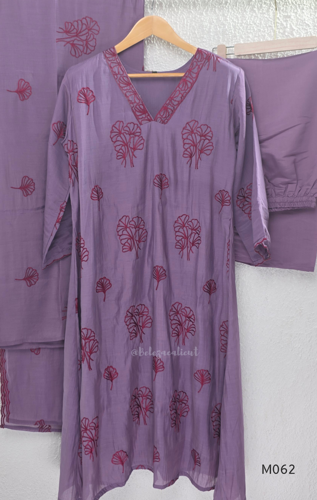 Mul chanderi A-line 3-piece churidar set in coral, lavender, mustard and rust orange with thread work.
