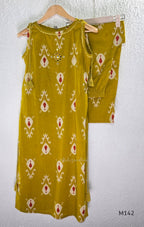 Mustard cotton top and bottom coord set with cream and rust motifs, tassel detailing and front mirror work.