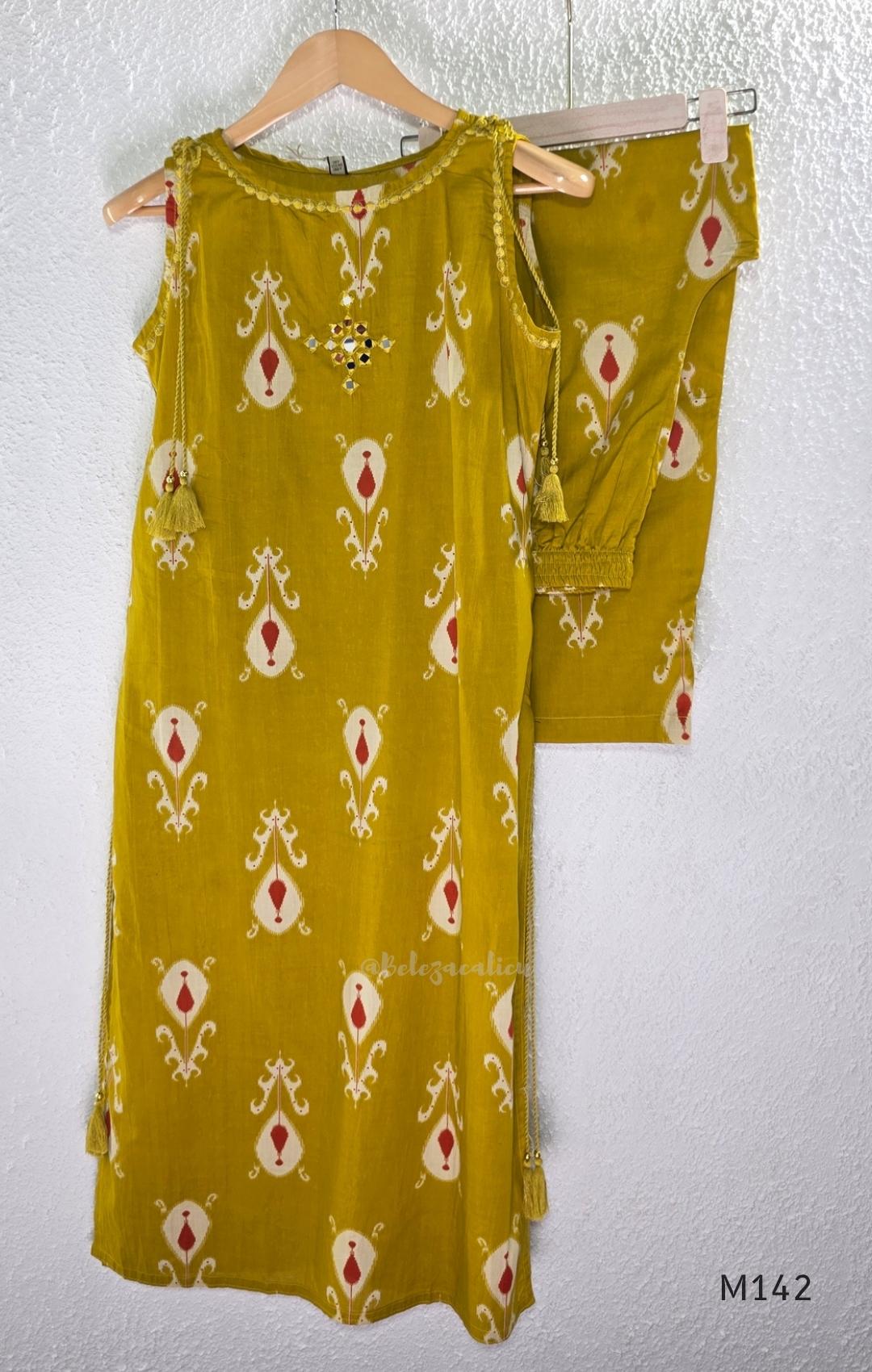 Mustard cotton top and bottom coord set with cream and rust motifs, tassel detailing and front mirror work.